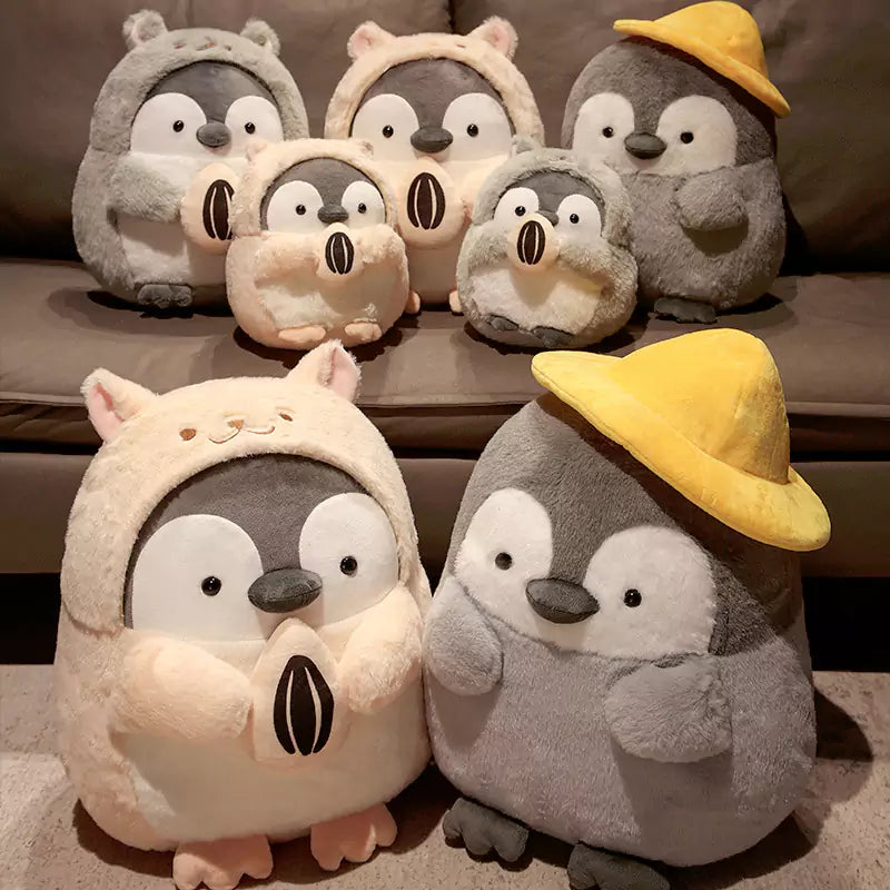 帽子をかぶったかわいいペンギンのぬいぐるみ メロンの種を持った子供たちへのクリスマスプレゼント Dookilive
