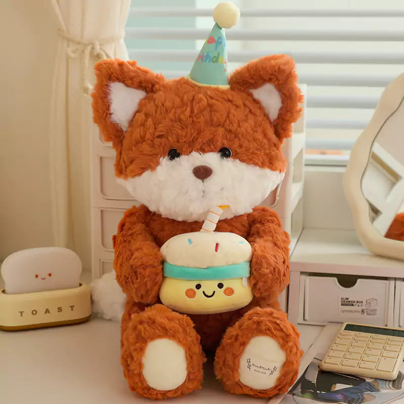 バースデーケーキのクマとキツネのぬいぐるみ