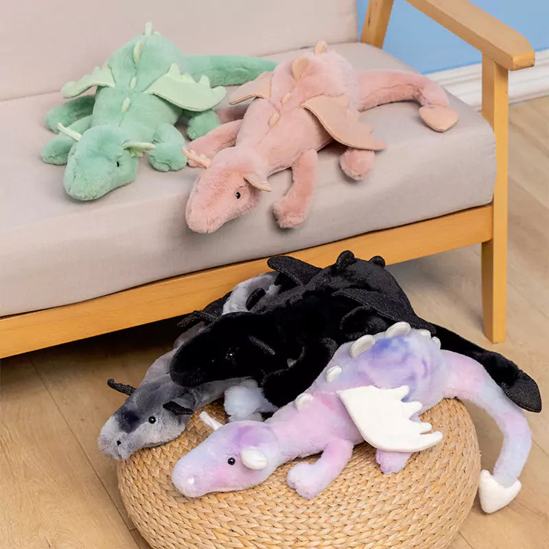 dragon plush doll on the sofa