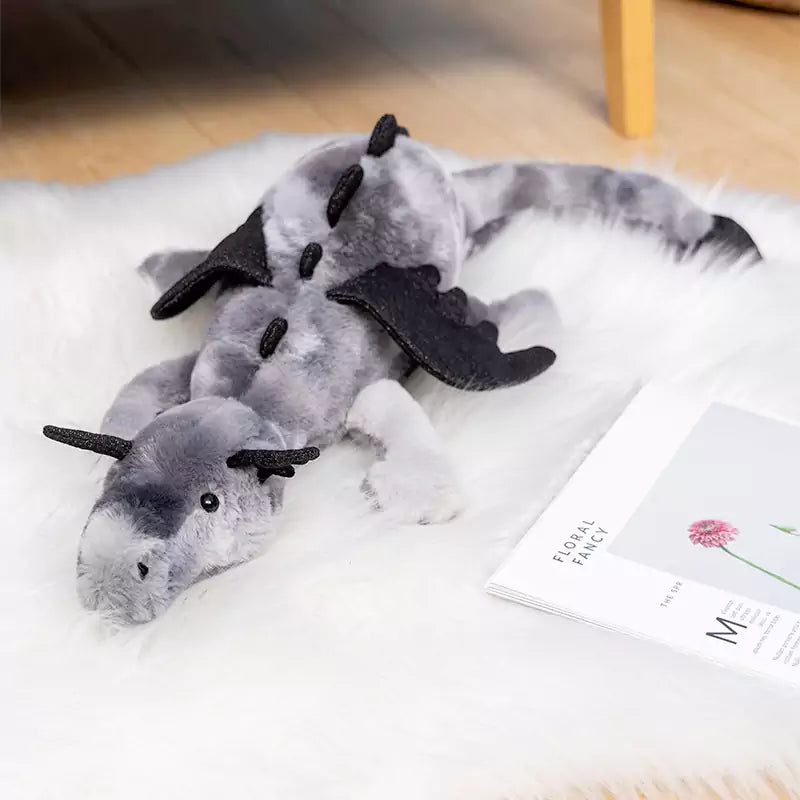 grey plush doll
