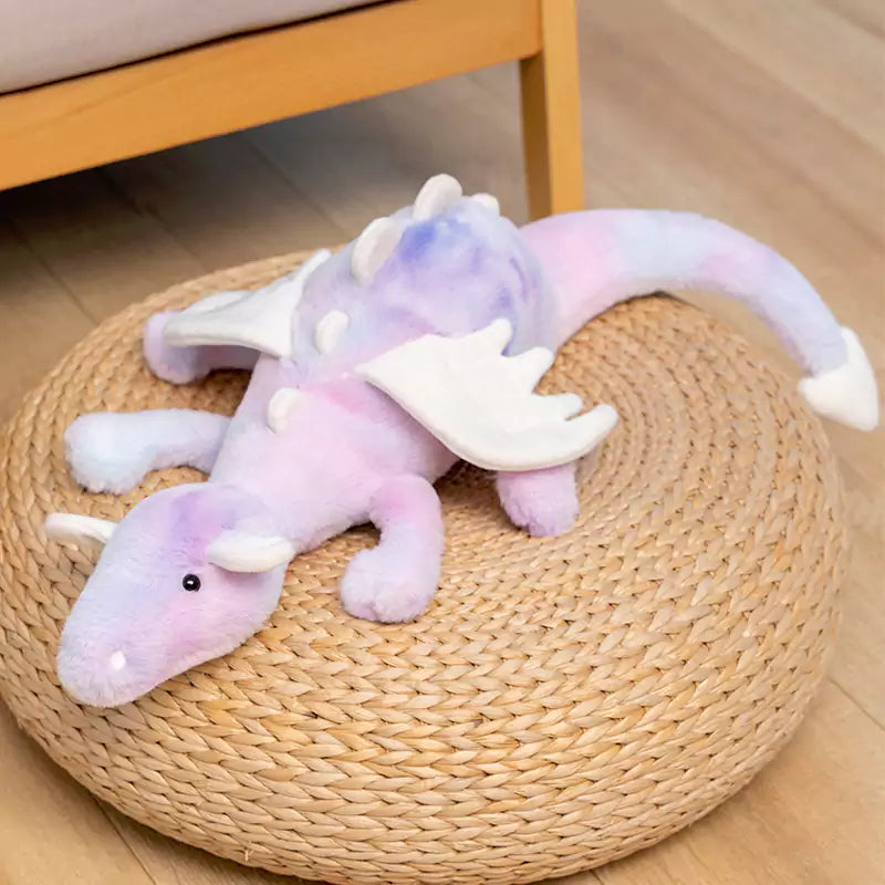 lilac plush doll on the floor