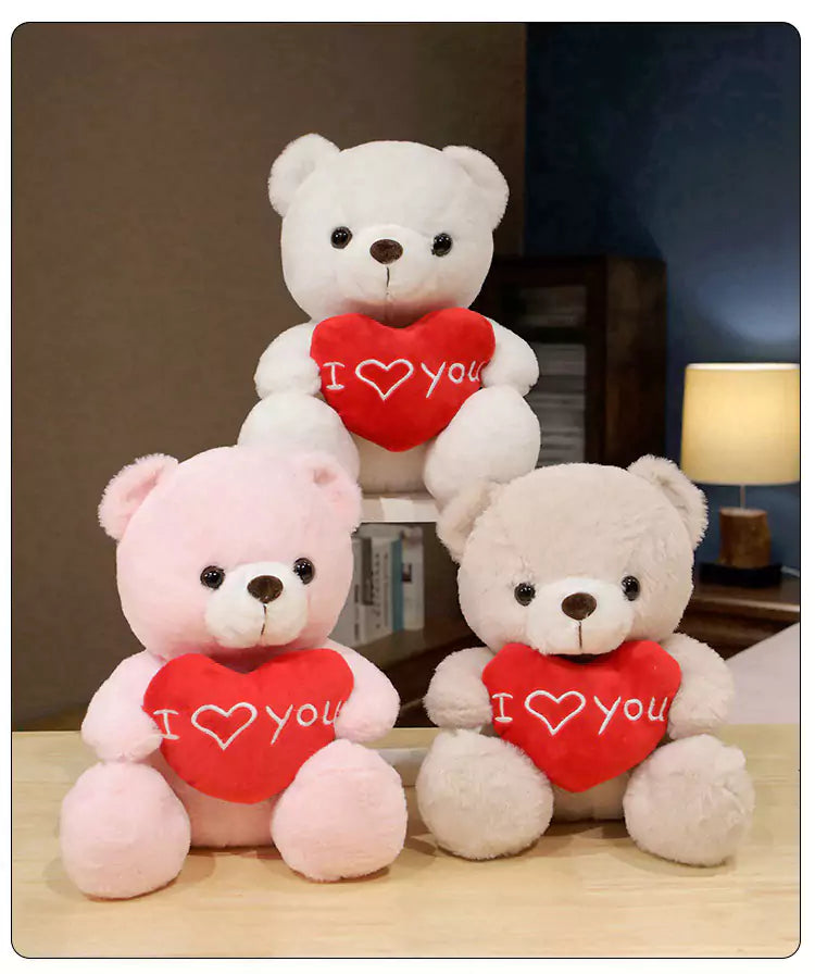 Three color bears sit together