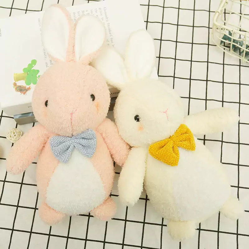 bunny stuffed doll with a bow