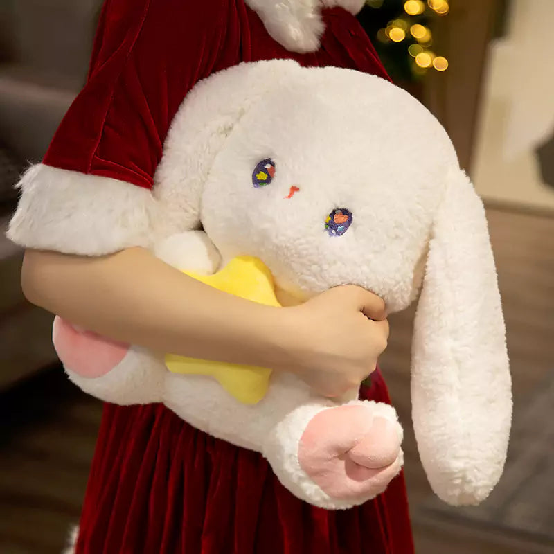 holding the rabbit doll