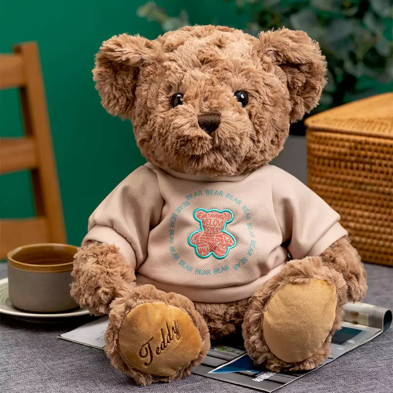 Los animales de peluche Dookilive Bear en suéter dan regalos de cumpleaños a niños y niñas