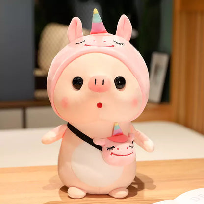 piggy stuffed animals wearing unicorn suits