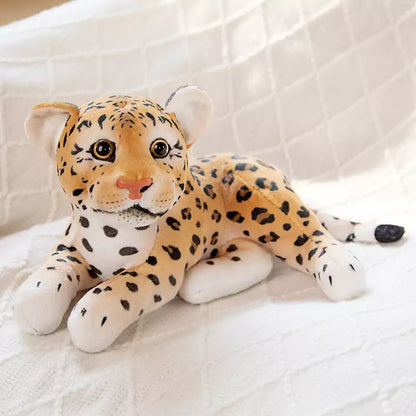 plush stuffed leopard lying on its side