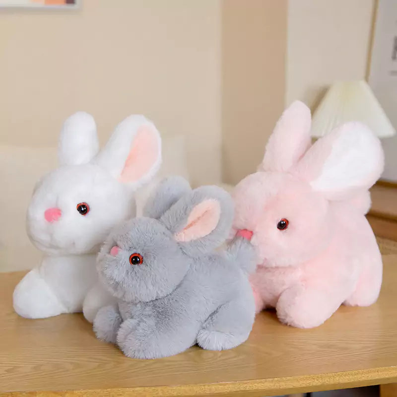 three rabbit dolls