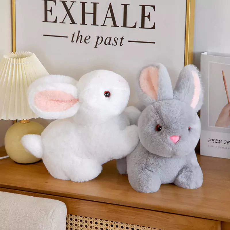 white and gray rabbit dolls