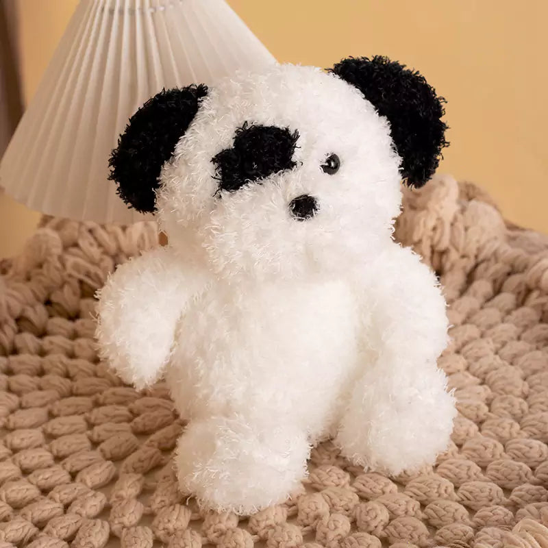 white curly haired dog stuffed animal
